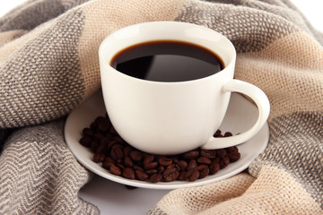 cup of coffee with scarf close-up