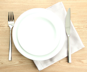 Table setting on wooden table