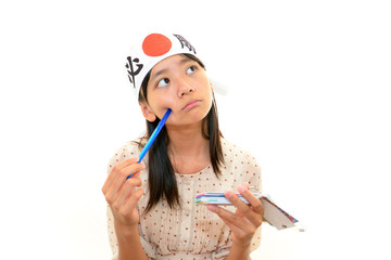 勉強に励む受験生の女の子