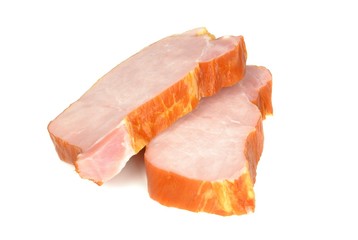 Two slices of gammon steaks on a white background