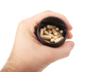 man holding bottle of pills