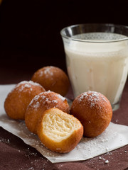 Doughnuts with glass of milk