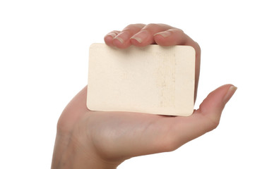 Hand holding blank paper card