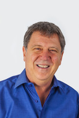 Obraz premium Portrait of a handsome older man looking and smiling