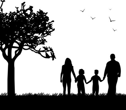 Family walking in park in spring silhouette