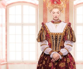 Her royal highness standing against window