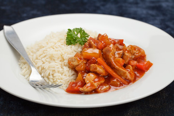 Schweinefleisch süß-sauer mit Reis