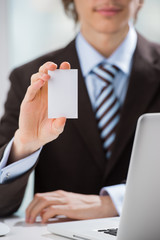 Closeup of torso of confident business man wearing elegant suit