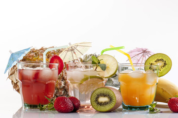 Fresh citrus juices isolated on white