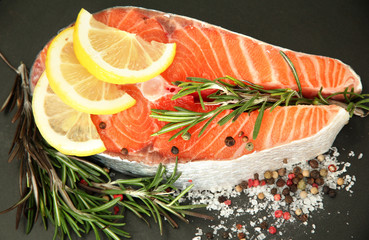 Fresh salmon steak on pan, close up