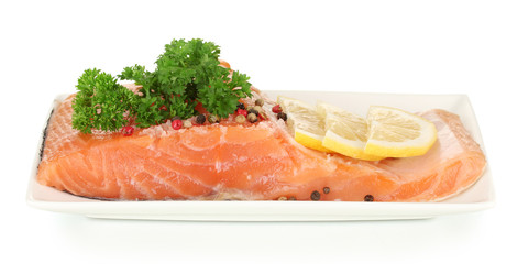Fresh salmon fillet with herbals and lemon slices
