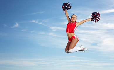 Young female cheerleader