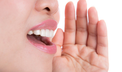 Naklejka premium Yelling woman mouth close up isolated on white background