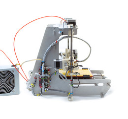 Photo of modern machine. 3-D printer