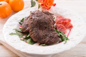 crunchy duck's breast with orange and rucola