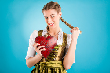 Young woman in traditional clothes - dirndl or tracht