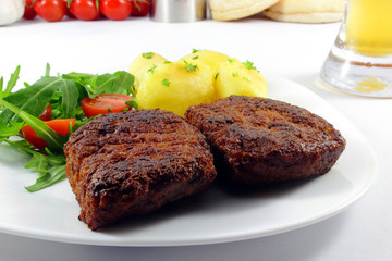 cutlets with potatoes - Hacksteaks mit Kartoffeln