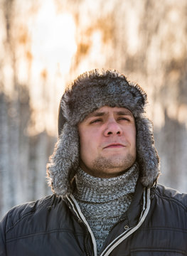 man in a fur winter hat