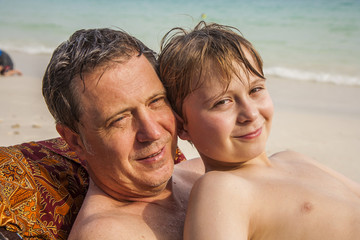 Fototapeta premium father is spooning with his happy smiling son