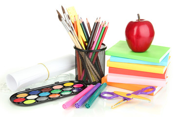 School supplies, books and apple isolated on white