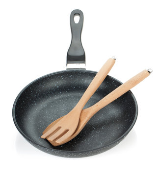 Frying pan with wooden utensils