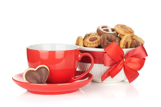 Red coffee cup and cookies