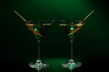 Martini glasses on dark background