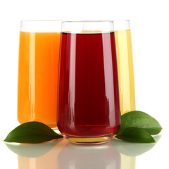 Glasses of juise and leafs isolated on white