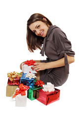 woman sits near a gifts