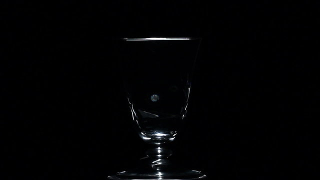 Glass silhouette on a black background