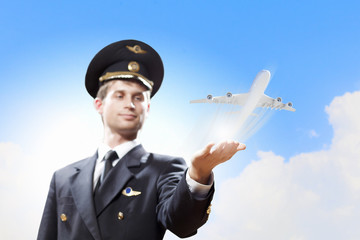 Image of pilot with plane in hand