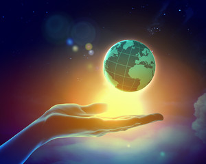 Image of earth planet on hand