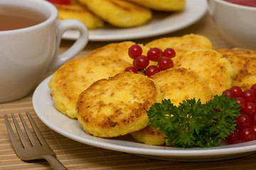 Sweet cheese pancakes on a plate