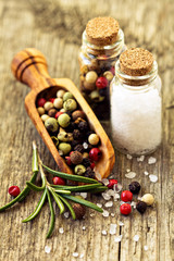 Salt and pepper on wooden table