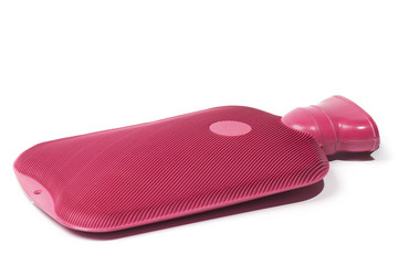 hot water bottle in pink, isolated on white background