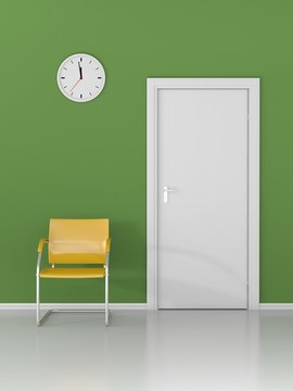 A wall clock and yellow chair in the waiting room