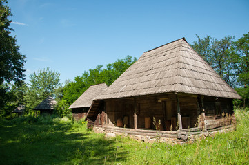 Traditional old wooden houses in rural Romania