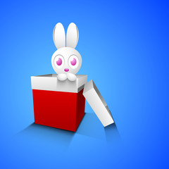 Cute Easter Bunny in red gift box on blue background.