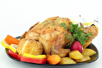 grilled chicken with potatoes on white