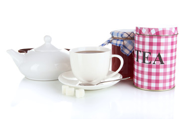 Jar and cup of tea isolated on white
