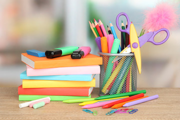 School supplies on wooden table