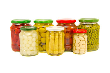various potted vegetables glass jars isolated on white