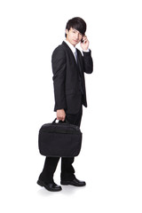 Business man Walking while speaking mobile phon