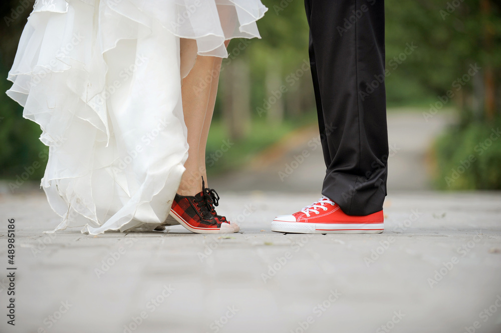 Wall mural Legs in Sneakers