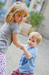Fototapeta premium Dancing brother and sister