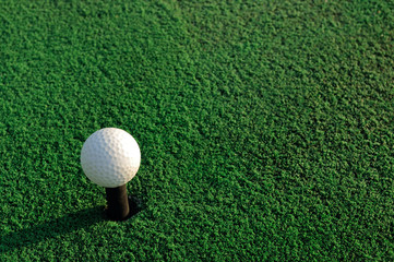 Golf ball on green grass field