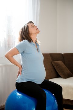 Pregnant woman with backache