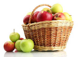 juicy apples in basket, isolated on white