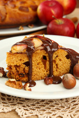 slice of tasty homemade pie with chocolate and apples,