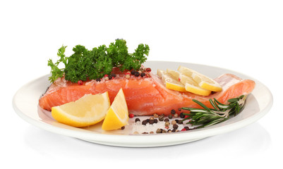 Fresh salmon fillet with herbals and lemon slices